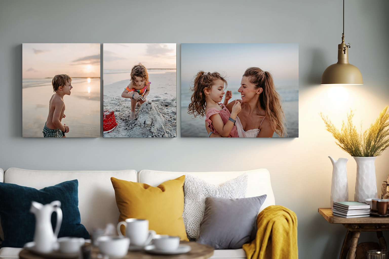 THE WALL IS ADORNED WITH THREE BEAUTIFUL CANVASES